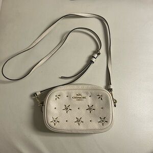 Coach White soft leather crossbody bag with flower details